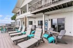 Bask in the Sunlight on Master Lodge`s Lakefront Patio - Now Featuring a Sun Umbrella for Ultimate Comfort